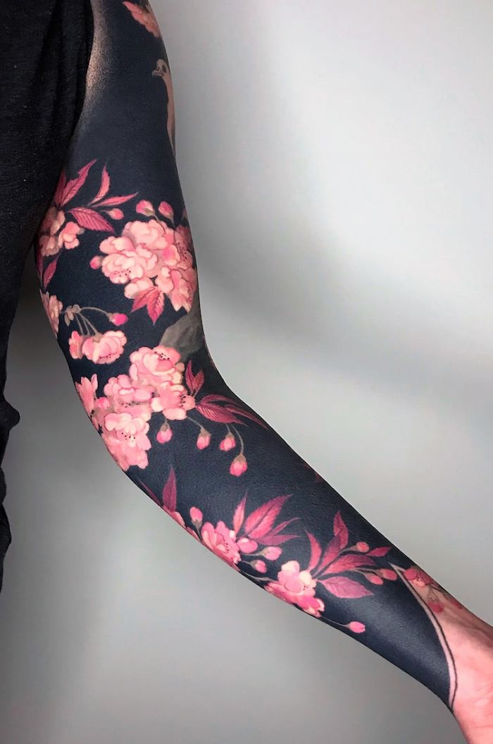 Intricate Floral Blackout Tattoo by Esther Garcia