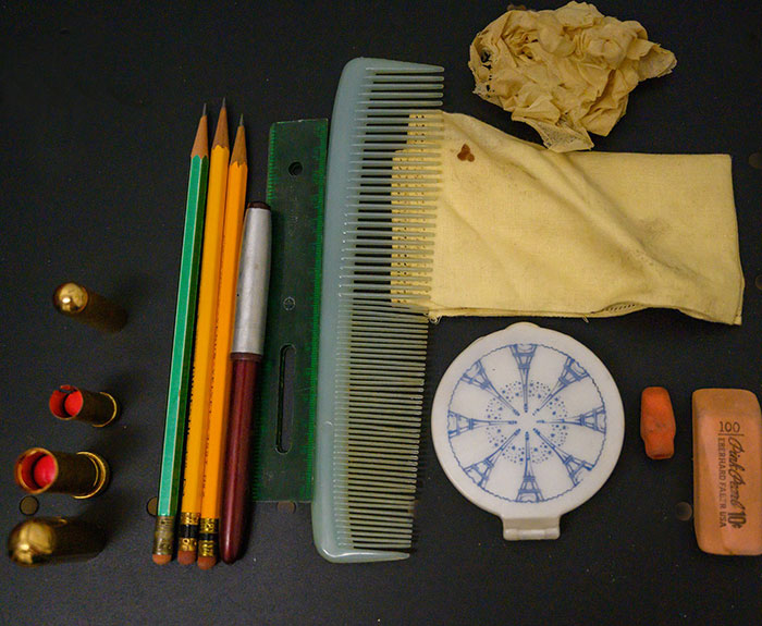 Makeup, Pencils, and a Comb Found inside Patti Rumfola's Purse