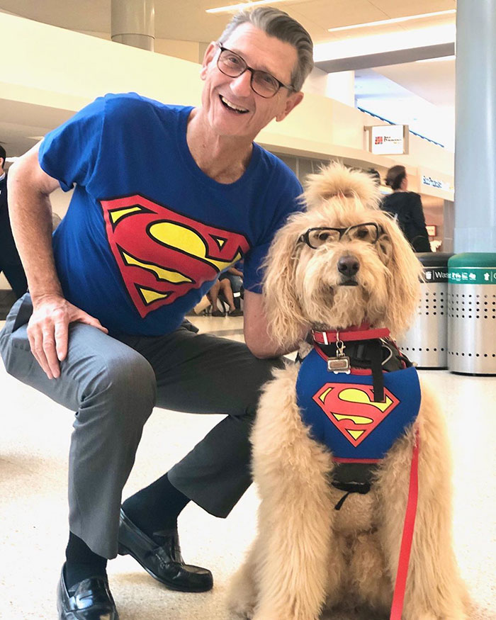 Man in Matching Superman Shirt with a Wag Brigade Dog Member