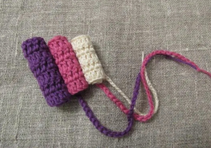 Purple, Pink, and White Crocheted Tampons