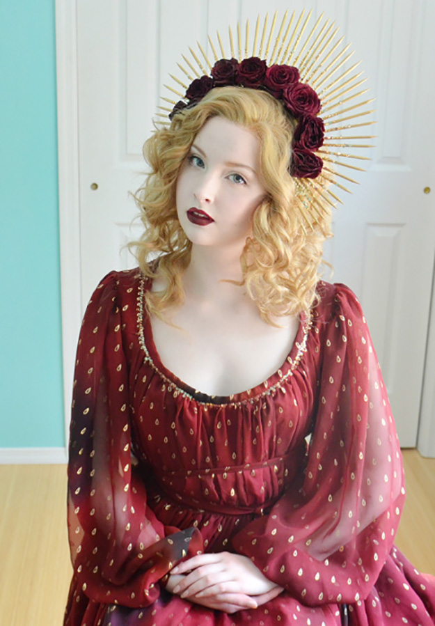 angela clayton poses in her heinrik mucke inspired constume