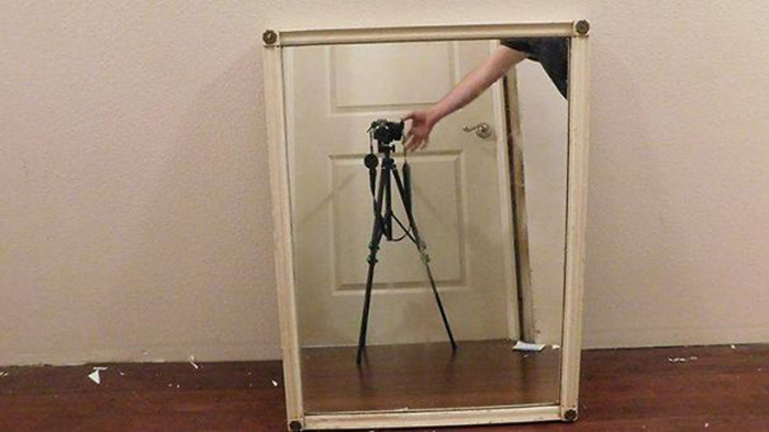 sellers avoiding reflection camera tripod