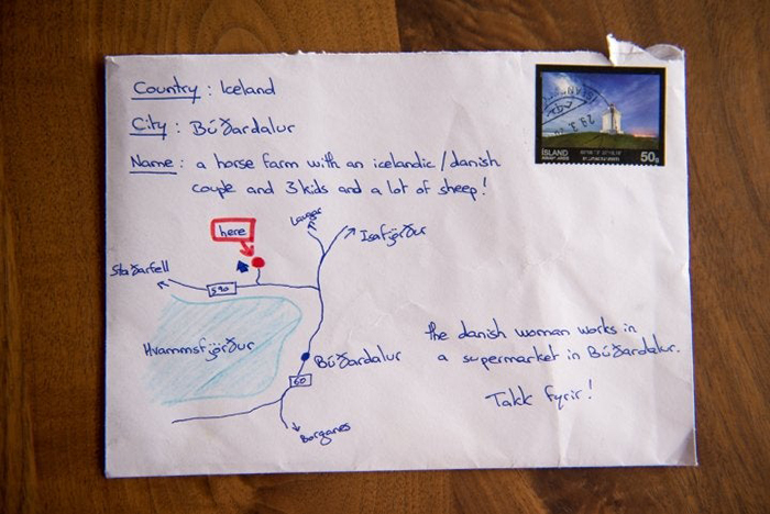 tourist draws map on envelope