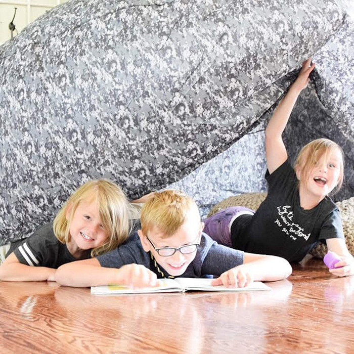 3 Kids Reading Books Inside Inflatable Play Tent