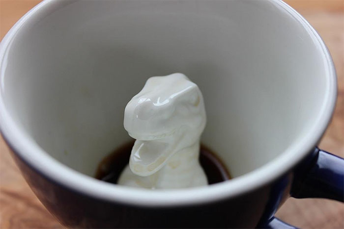 Dinosaur inside mug