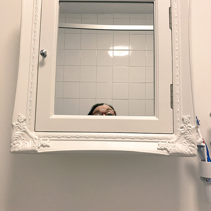 bathroom cabinet mirror too high