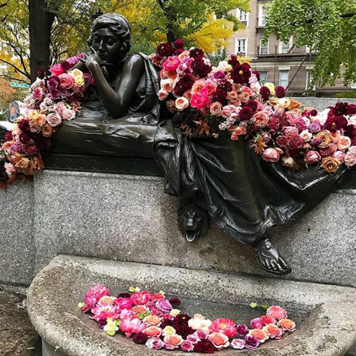 floral arrangement lewis miller miss manhattan statue