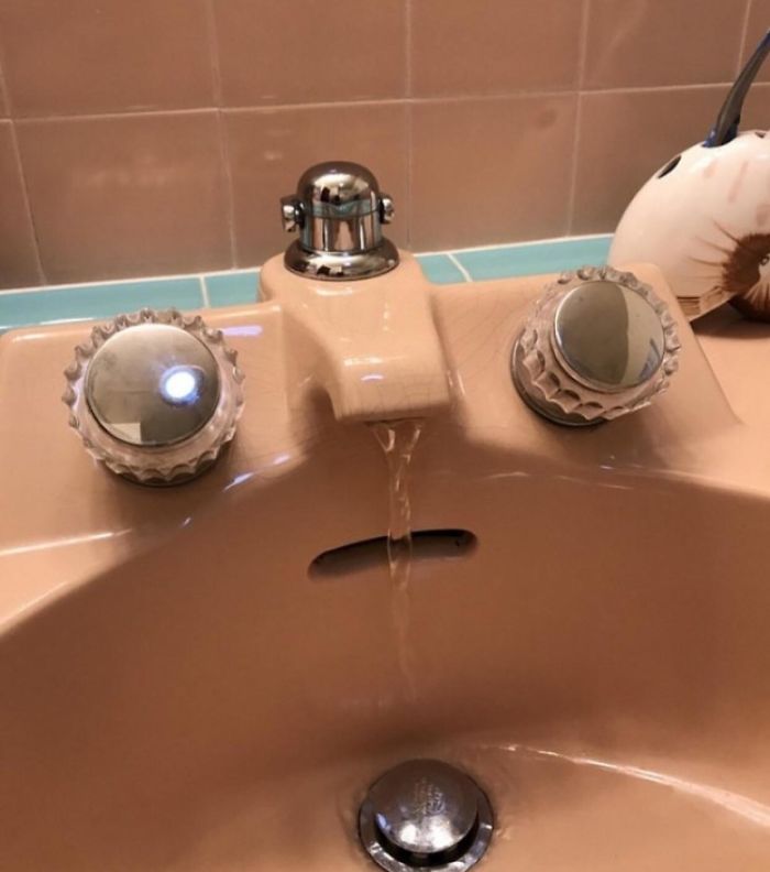 shocked face on bathroom sink