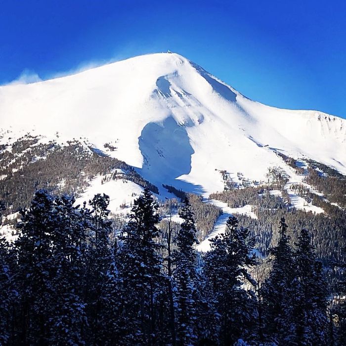 two men's silhouettes on lone peak, montana pareidolia