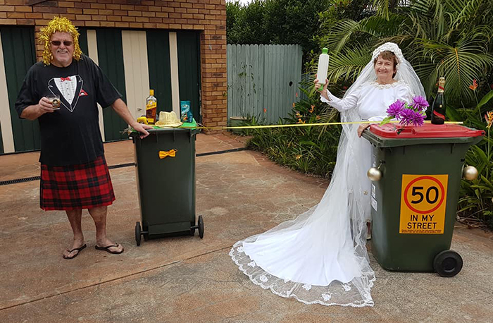 Bin Isolation Outing Couple in Wedding Outfits Taking Bin Out