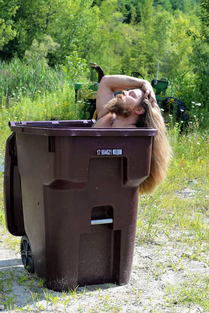 Bin Isolation Outing Long-haired Man Inside Bin