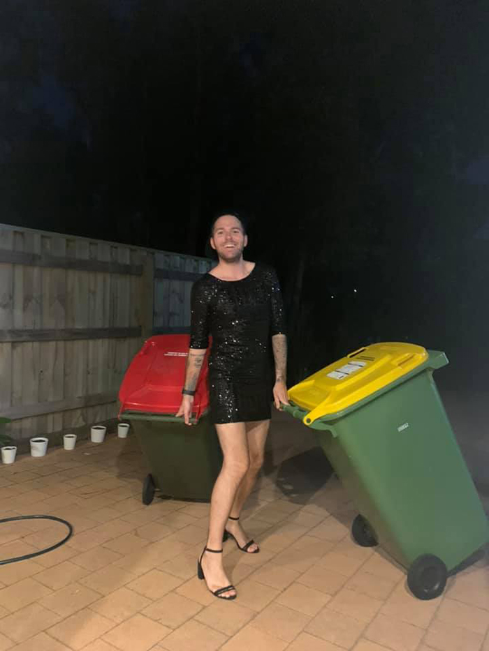 Bin Isolation Outing Man in Black Dress Taking Bin Out