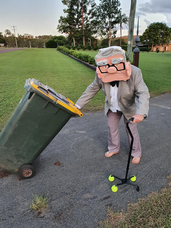 Bin Isolation Outing Woman in Carl Fredricksen Outfit Taking Bin Out