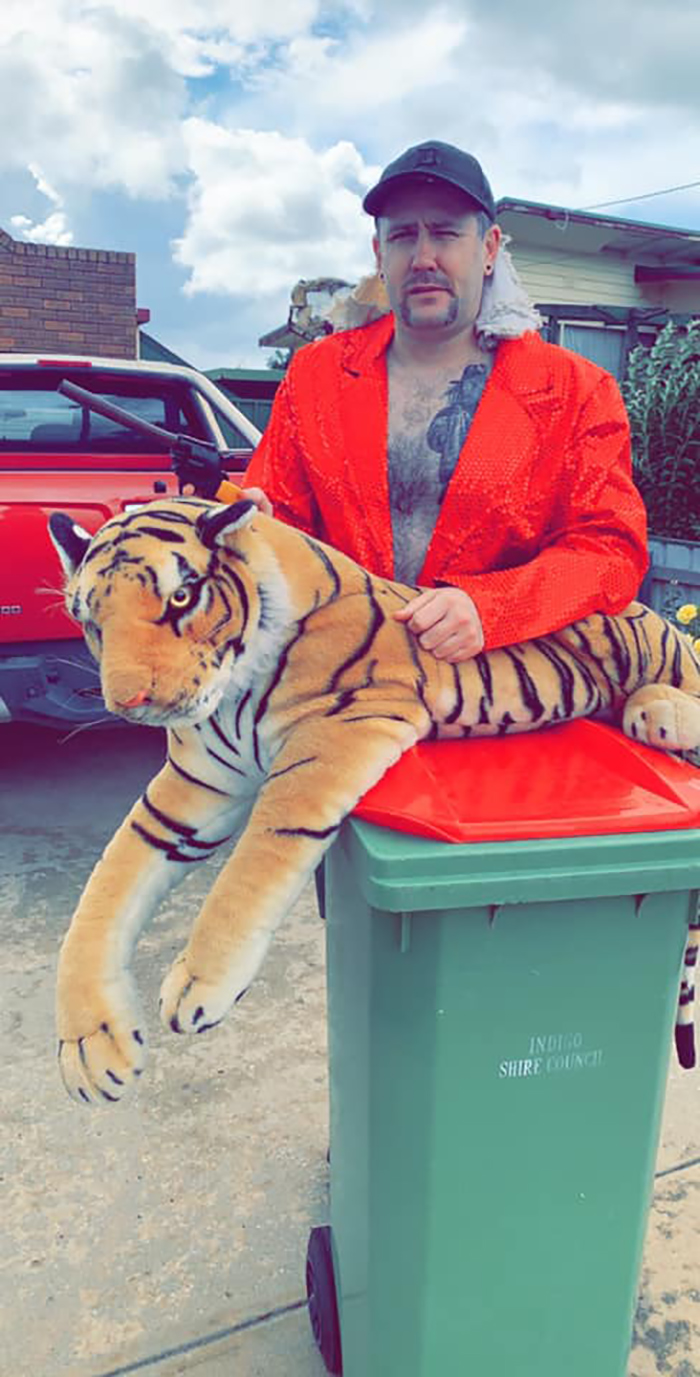 Man Dressed as Joe Exotic Taking Trash Out