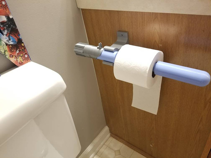 lightsaber mounted toilet paper holder blue