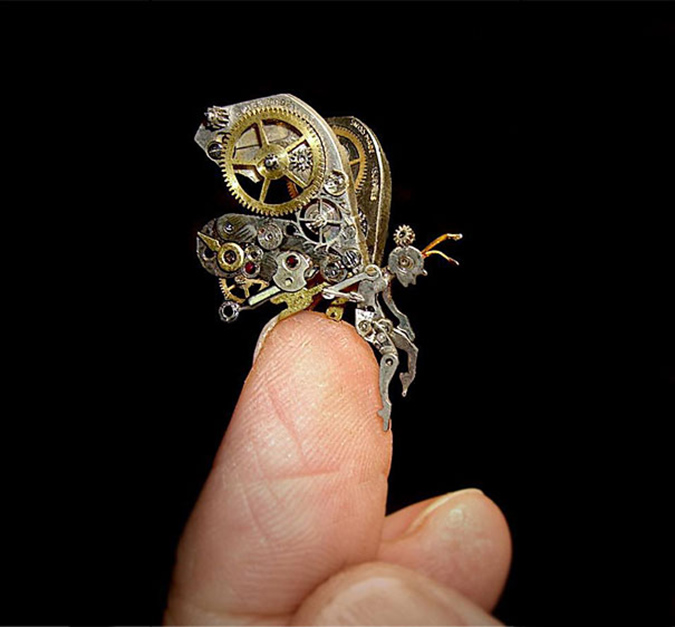 steampunk sculpture of a fairy on susan's fingertip