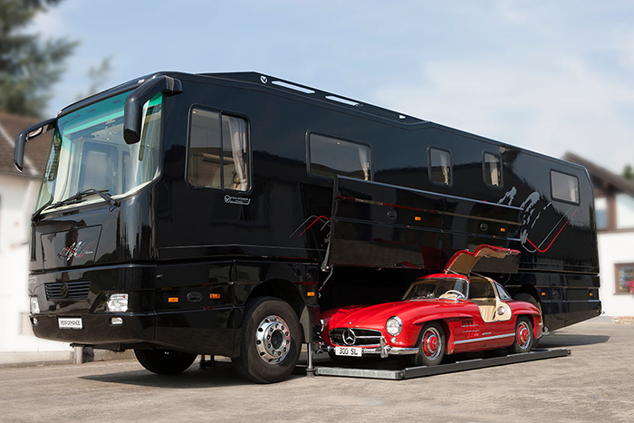 black volkner mobil luxury motorhome with built-in garage