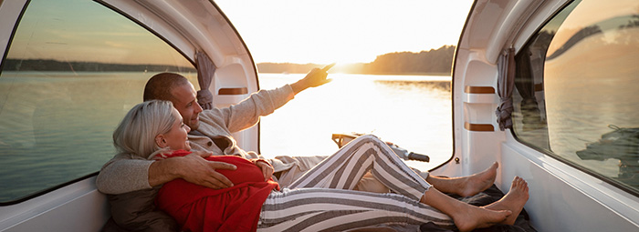 couple aboard sealander watching sunset