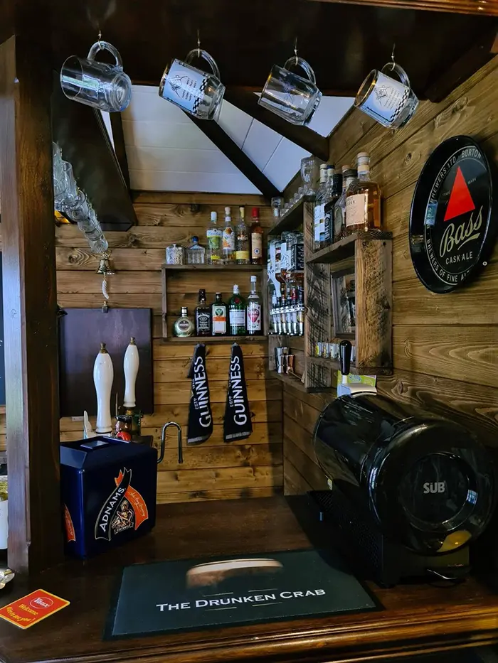 the drunken crab interior hanging beer mugs
