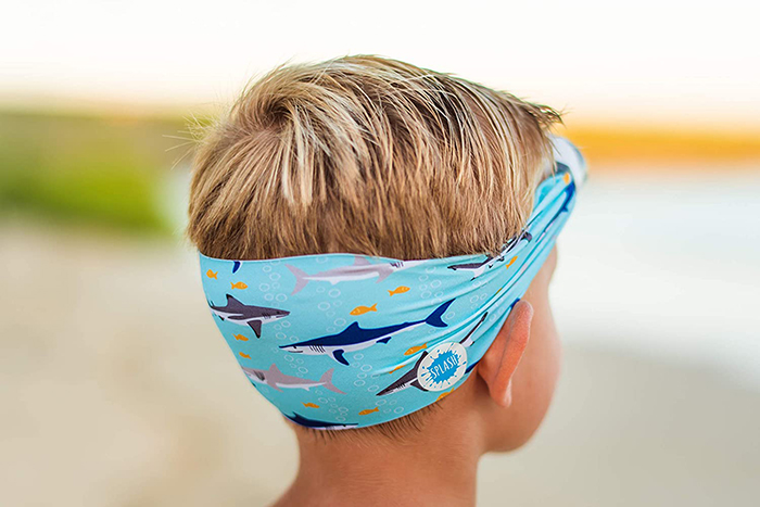 Boy Wearing Swimming Eyewear with Protective Fabric for Hair in Shark Print