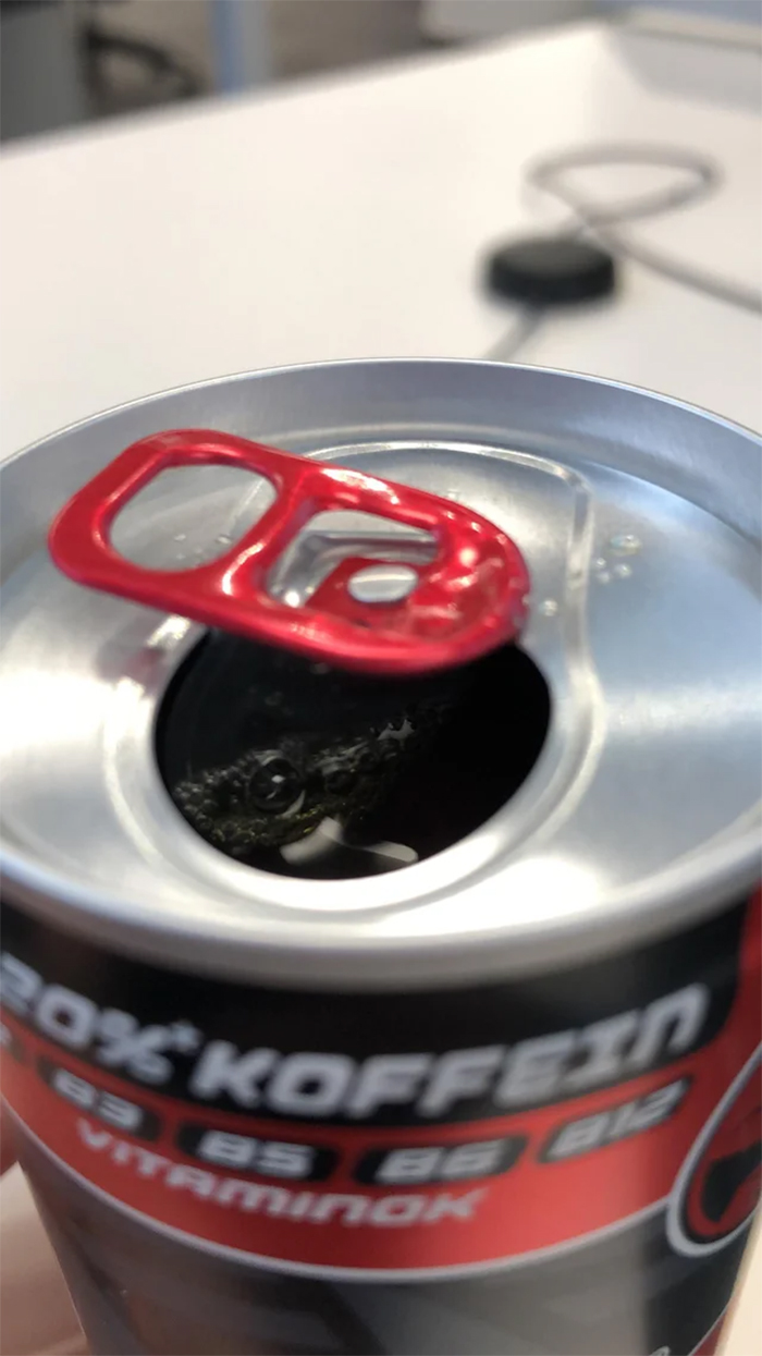 canned drink has crocodile illusion