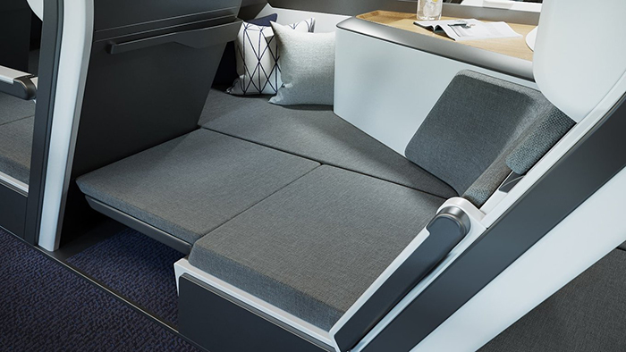 economy class plane seat with full lie-flat functionality