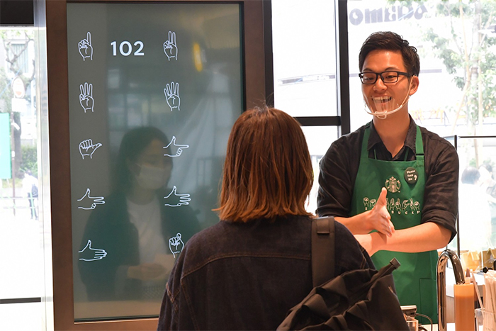 japan coffee shop uses sign language