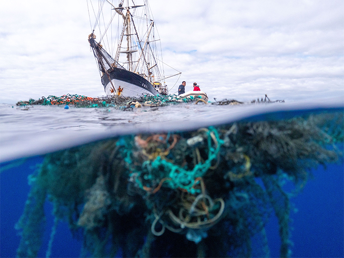 large net ocean plastic underwater