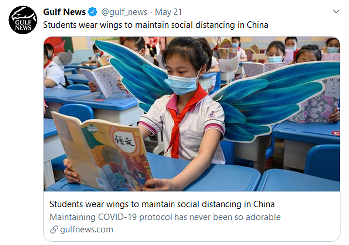 chinese students wear wings physical distancing