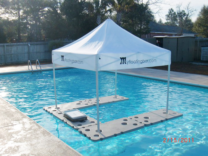 floating bar with white canopy