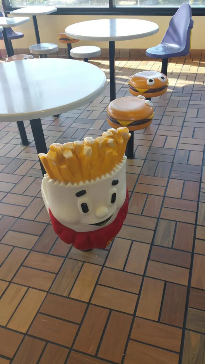 burger and fries seats at a fast food chain