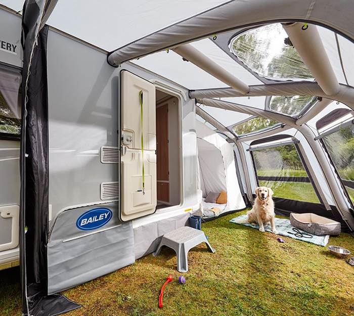 dog under an inflatable rv awning