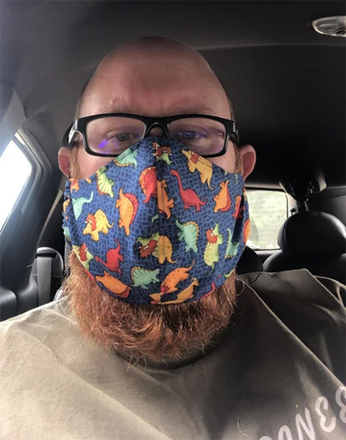 face mask with dinosaur pattern