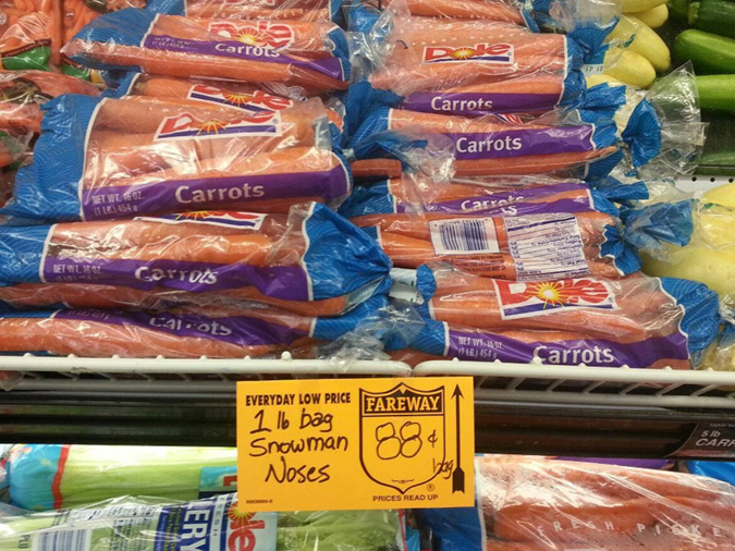 supermarket staff labels carrots as snowmans nose