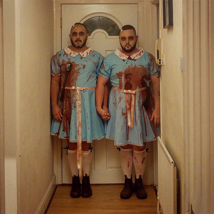 brothers dressed up as shining twins