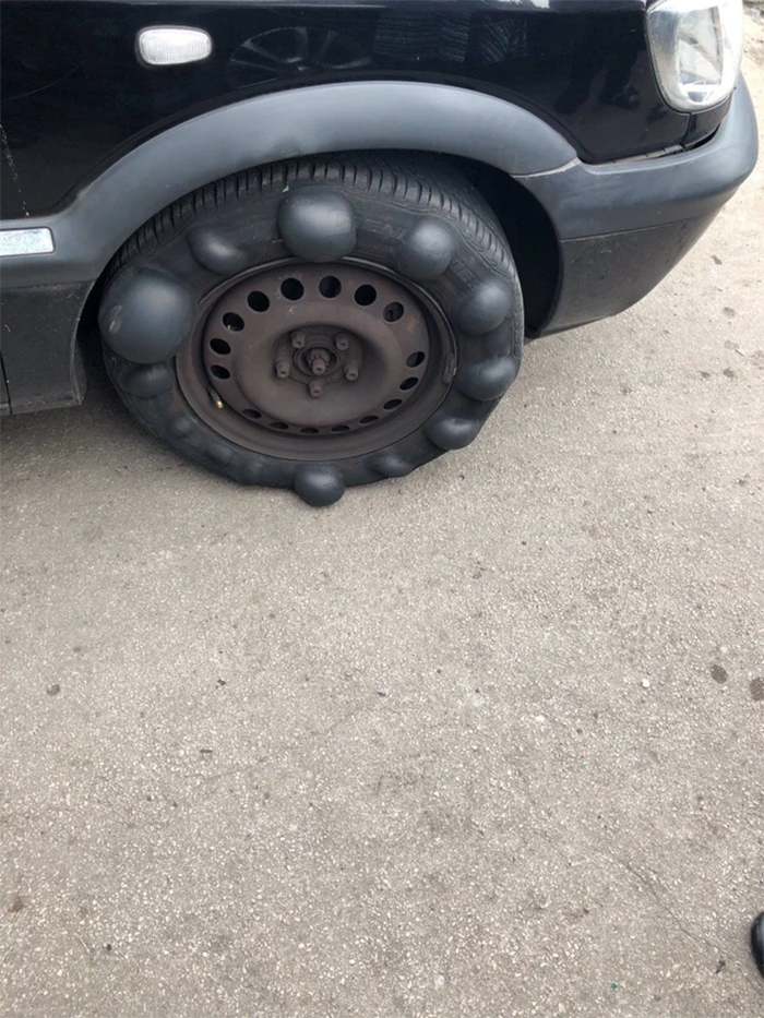 car tire about to burst