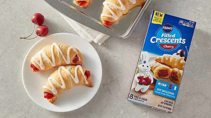 cherry-flavored crescents with icing