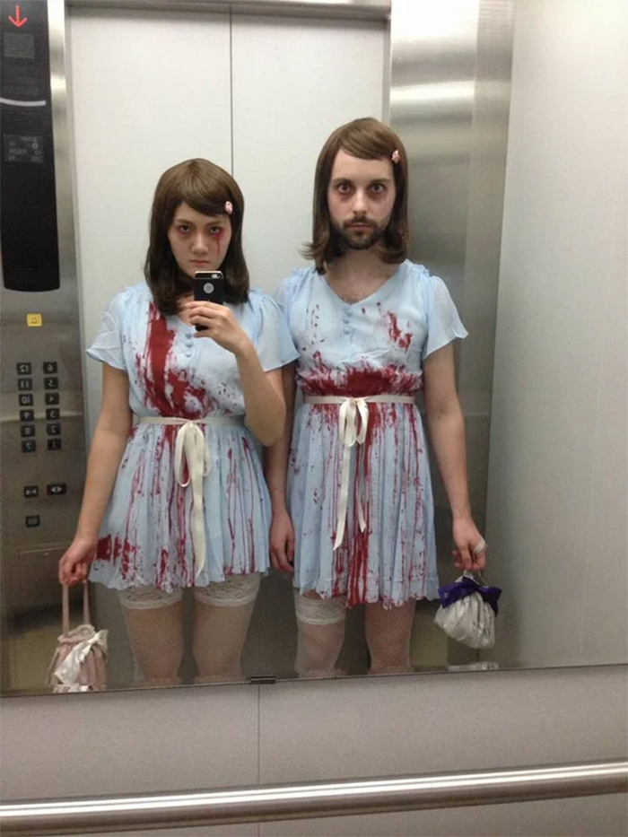 couple dressed up as shining twins