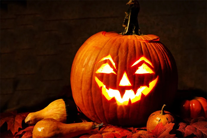 creepy jack-o-lantern lit