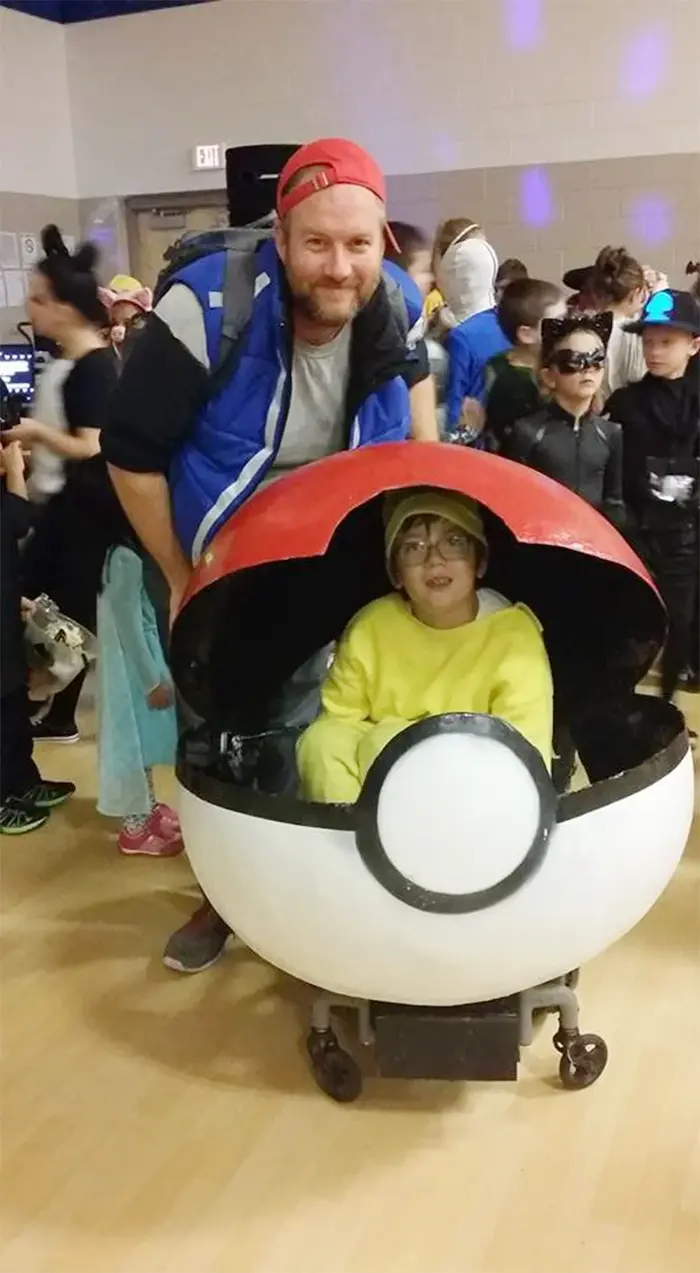 dad makes pokeball wheelchair for son