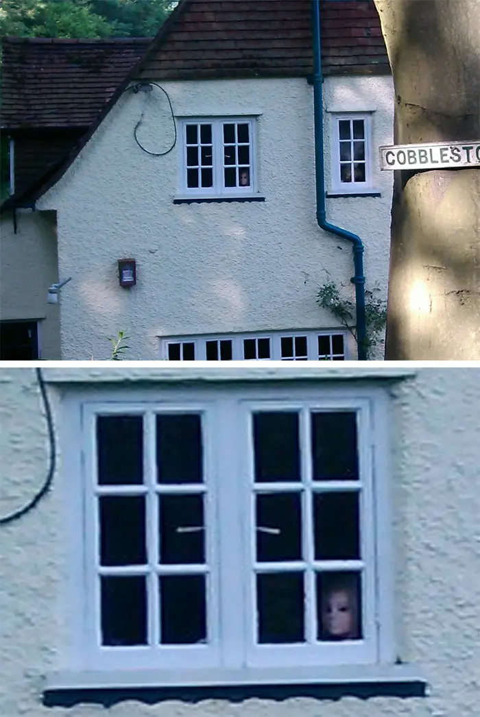 funny neighbours spooky face on the window