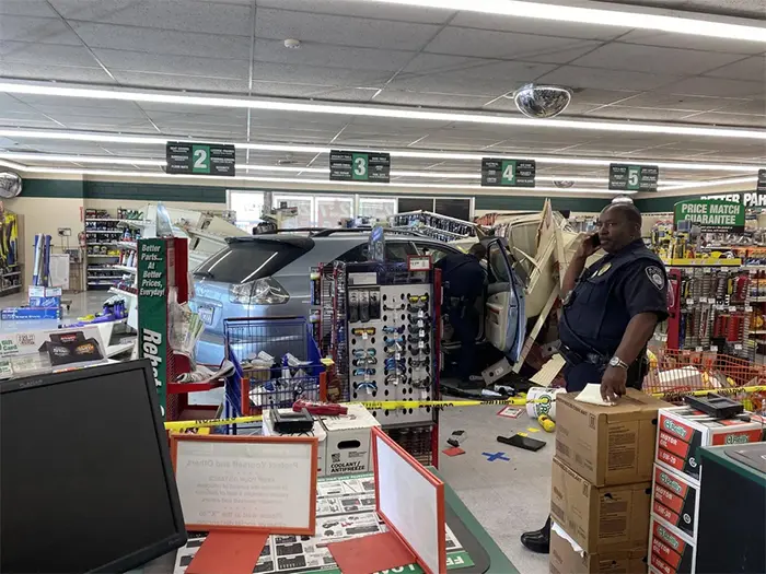 lexus crashes into a grocery store