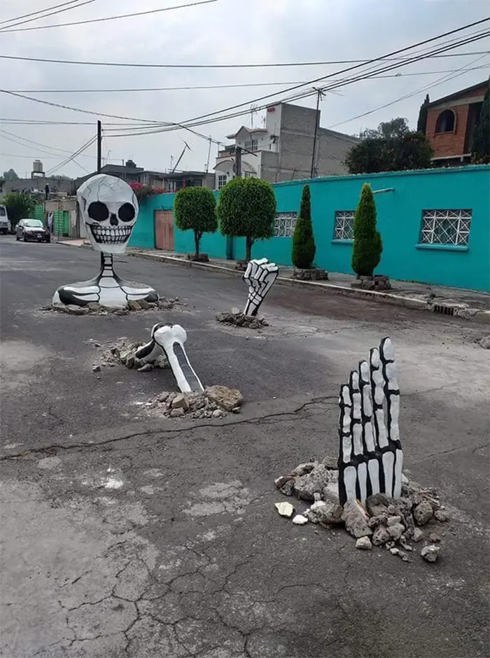 spooky outdoor display road skeleton