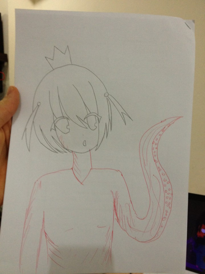 teacher doodles a body and tentacle arm to complete student's drawing