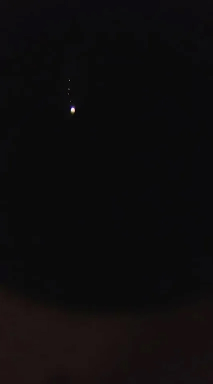 toy telescope shows jupiter and moons