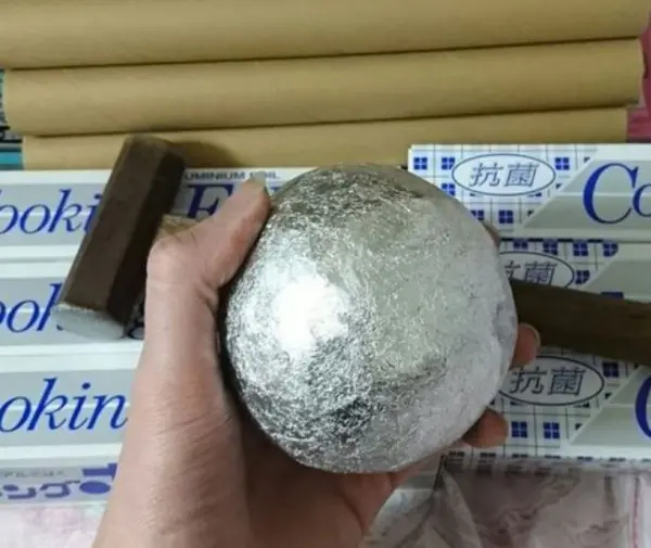 aluminum foil balls flatted by ball-peen hammer