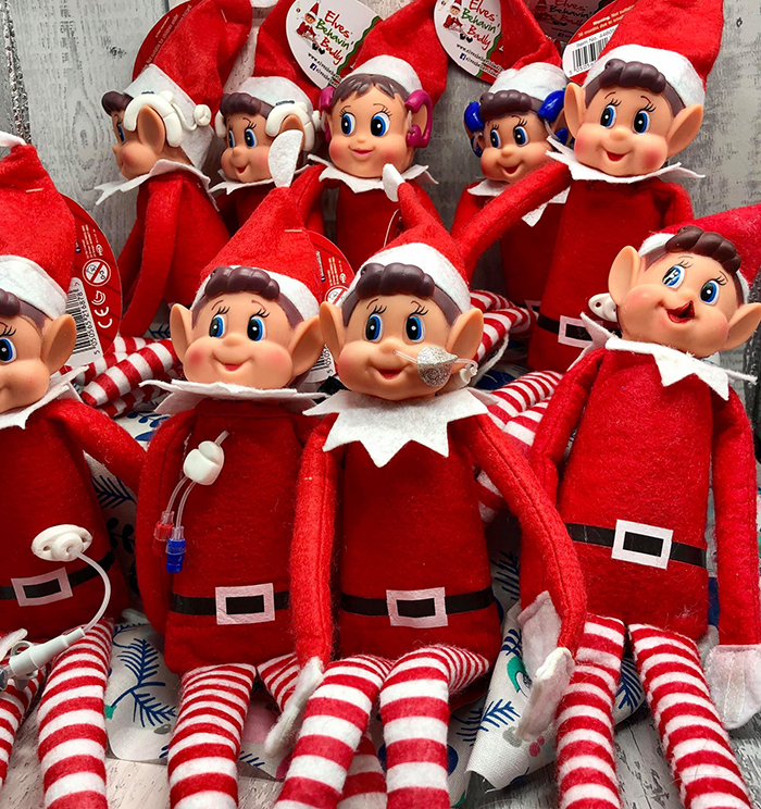 christmas elf toy figures with different medical conditions
