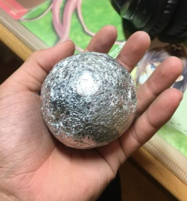 compressed and flattened ball