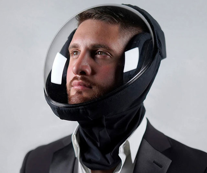 man wearing a black ventilating helmet