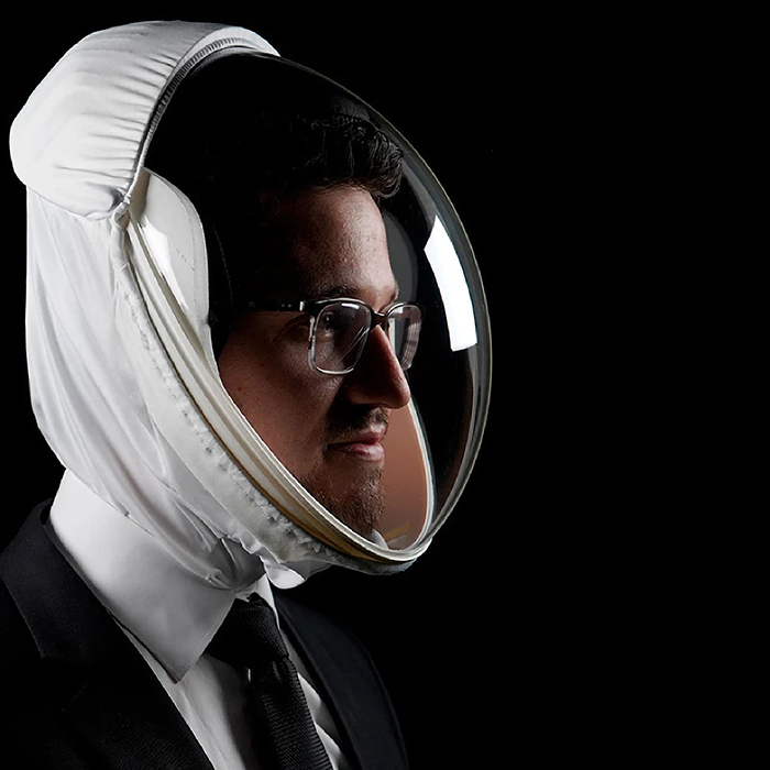 man wearing a white ventilating helmet
